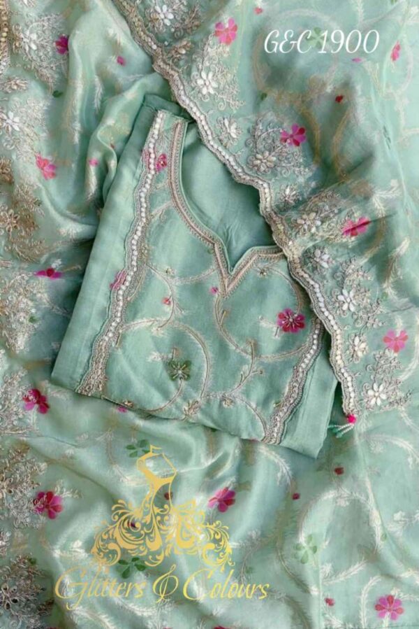 Pure Shimmer Silk Designer With Beautiful Designer Zari Weaved Tissue Patchwork Plus Hand Embroidery Suit